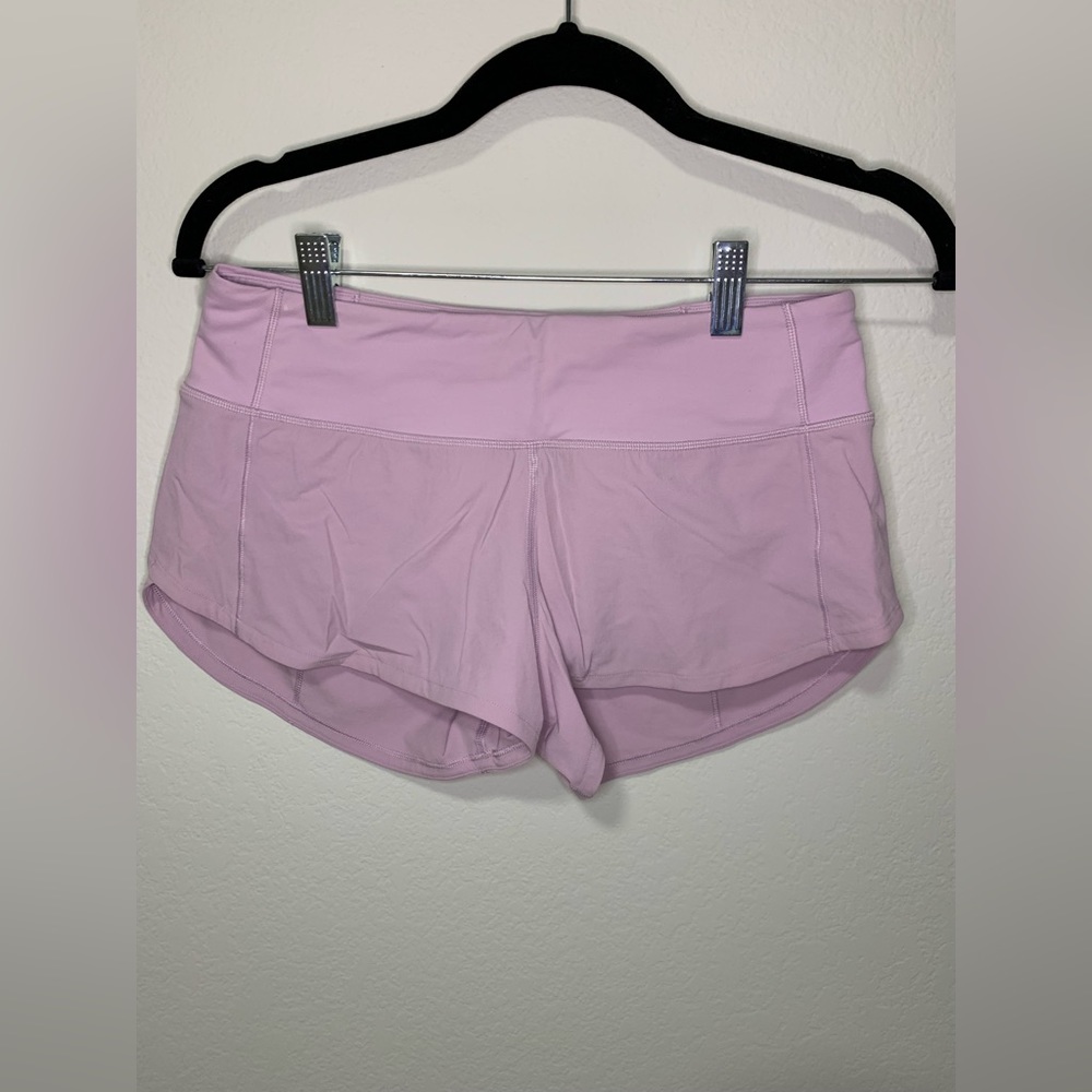 LULULEMON purple athletic shorts. Size 4.